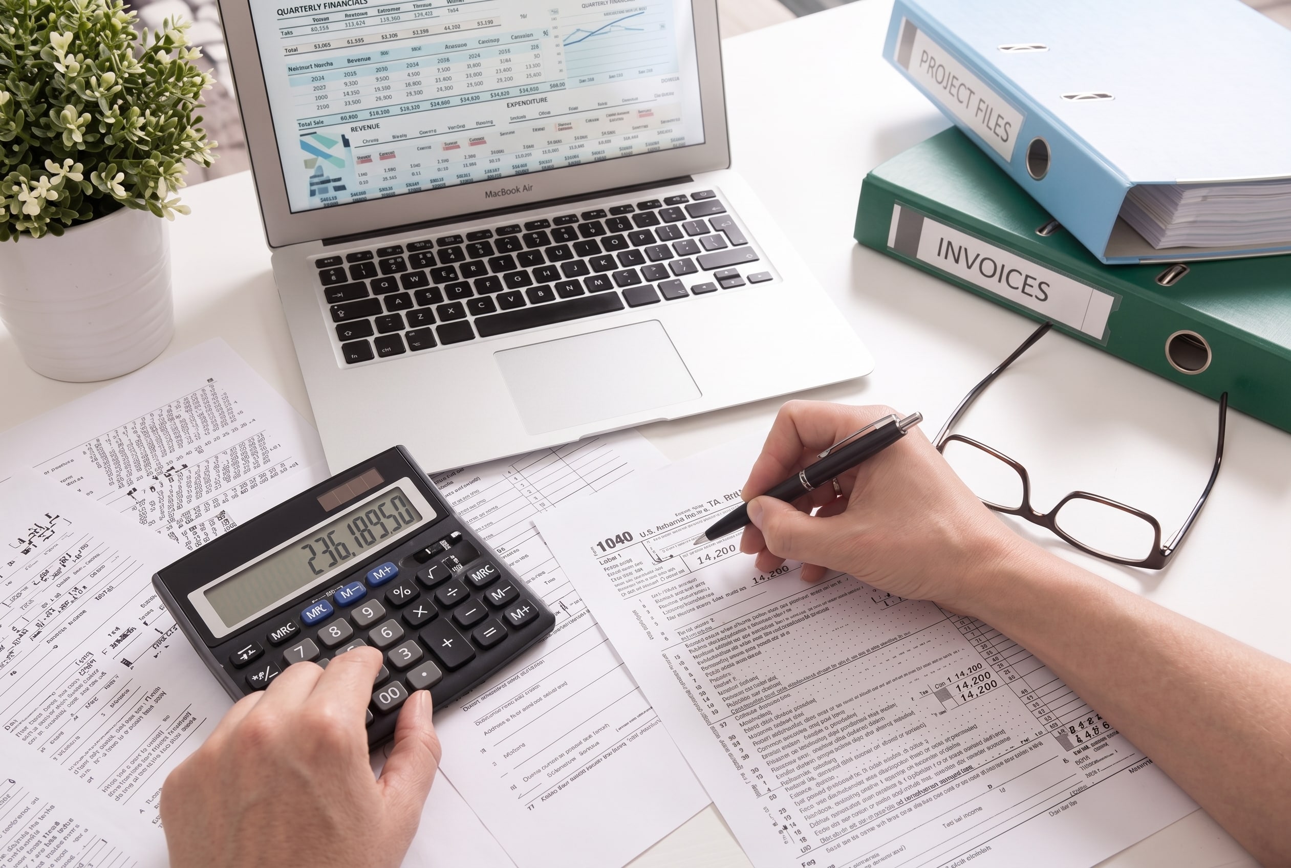 Reviewing financial figures and pension growth for retirement planning